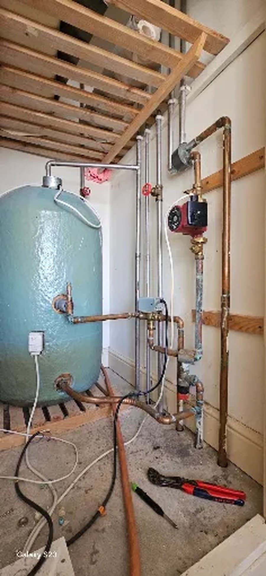 Vented hot water cylinder with new copper pipework and pump